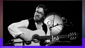 Al Di Meola Ovation- 2nd image of Al Playing acoustic guitar