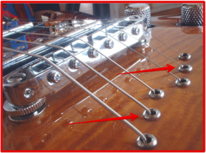 Washburn Parallaxe Guitars - Image of guitar string through design bridge 