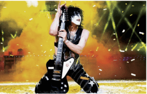 Paul Stanley signature guitar-Image of Paul Stanley playing live onstage for CTA