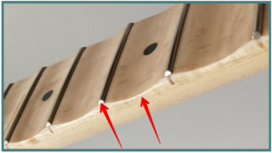 Scalloped Guitar Fretboard -Image of a U shaped scalloped Maple guitar neck