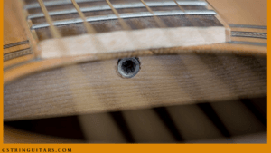 Guitar Truss Rods-The image of a truss rod within a sound hole