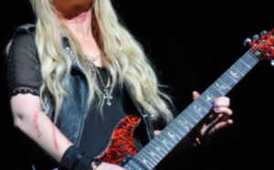 Orianthi Signature Guitar-Feature image of artist onstage playing guitar live