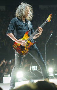 Kirk Hammett Signature Guitar- Image of KH Playing guitar live on stage for CTA image