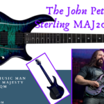 John Petrucci guitar- Image of the guitar and the artist on stage as well as the guitar from the back.