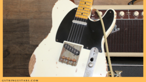types of guitar bridges-image of a bridge on a Fender Tele