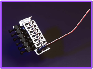 Super Strat guitars-Image of the original Floyd Rose Double Locking Tremolo Bridge 