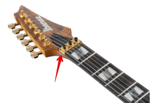 Super Strat guitars-Image of a Floyd Rose Bridge and Nut locking system on Ibanez
