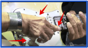 Jeff beck signature stratocaster-Image of the Artist onstage Showing how he uses his fingerstyle techniques