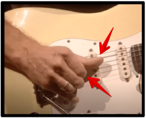 jeff beck's guitar style-Image of Beck right hand showing off some of his technique with his thumb and index finger