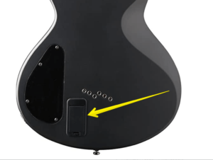 Active vs Passive Guitar Pickups -Image of an Active pickup Battery compartment on back of guitar