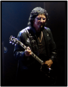 Epiphone Tony Iommi Signature G 400 -an image of the Artist playing live and used as a CTA image