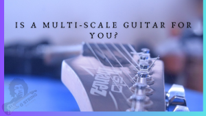 multi scale guitar- Image of a Ibanez guitar from the headstock 