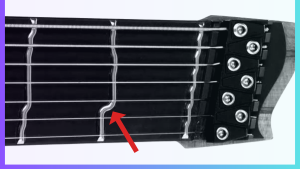 multi scale guitar- Image of a 7 string guitar with Temperament Frets