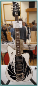 Edmonton Guitar Show- Image of a Duesenberg 007 model guitar