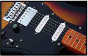 7 Ways To- Upgrade An Electric Guitar-Image of a Fender Strat with pickups and strings 