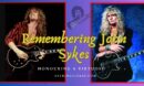 john sykes- The Feature image of the artist live on stage with his black guitar and standing with his black guitar