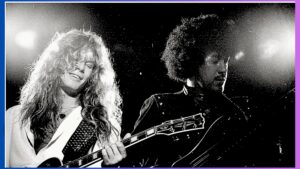 John Sykes-image of him playing live with Phil Lynott in concert 